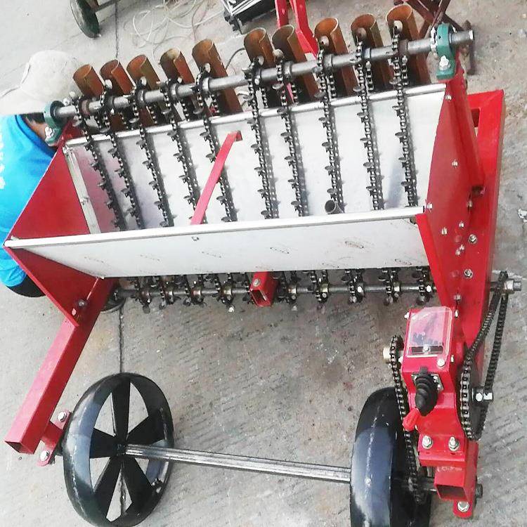 四川大蒜播种机电动手推种蒜机四轮车牵引式6行8行10行大蒜播种机