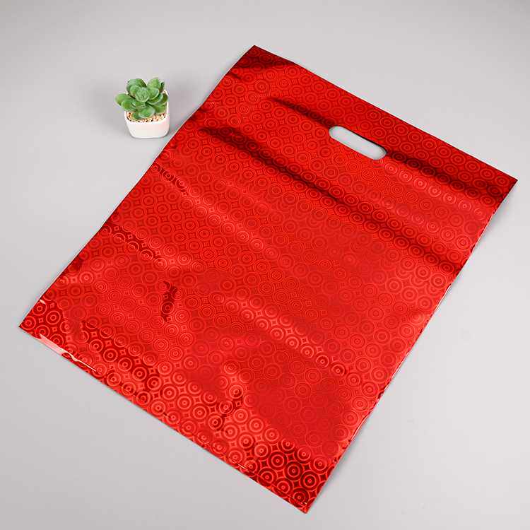 镭射复合通用包装PE平口塑料服装袋冲孔四指彩印大红色时尚礼品袋