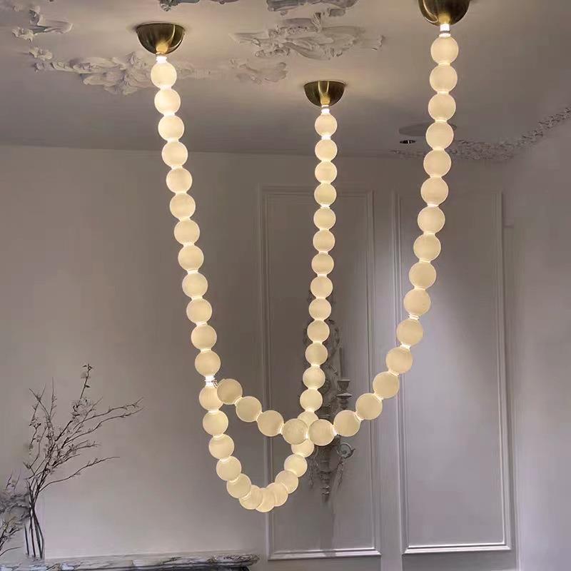 铜法式客厅灯现代简约设计师餐厅吧台长条项链灯佛珠复式楼梯吊灯