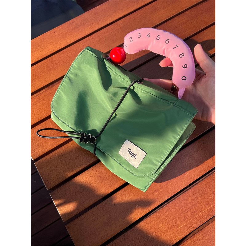 Tagi.哈兜蛋卷收纳包可爱便携撞色旅行洗漱折叠小众