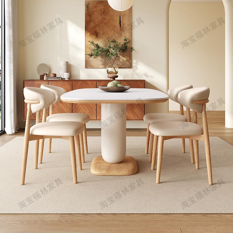 侘寂奶油风原木色岩板餐桌椅组合北欧家用小户型实木椭圆形饭桌