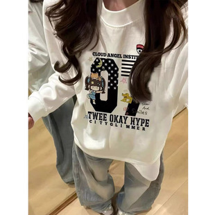 重磅纯棉可爱卡通印花长袖T恤女大早秋款初中高中大学生宽松上衣