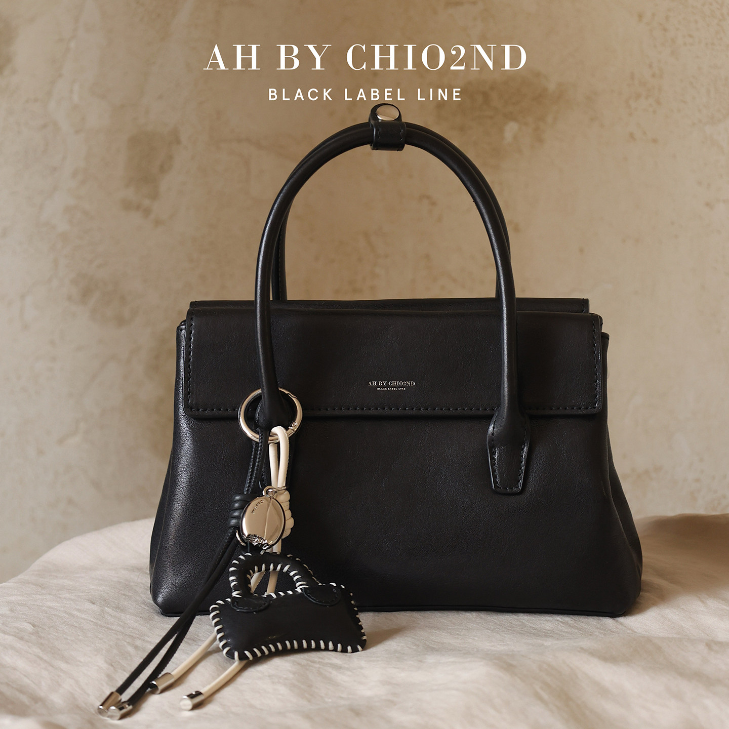 南风AH高端系列牛皮手提包包女2026新款真皮高级感轻奢单肩斜挎包