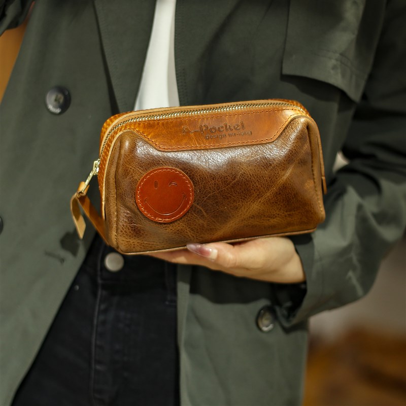 文艺复古真皮女士手拿包软皮化装包 多功能收纳包 笑脸Z包手工纯