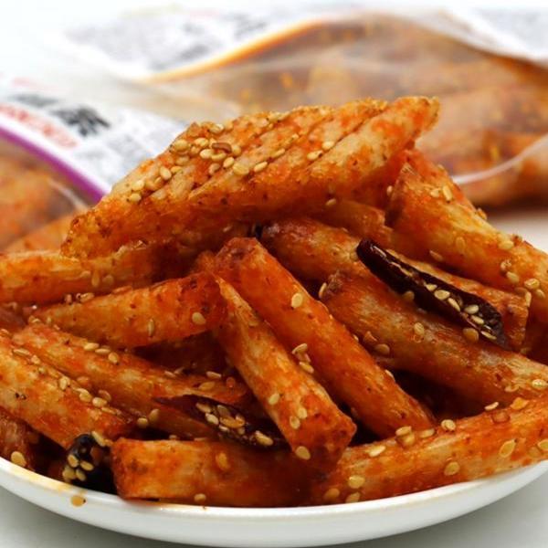喜洽手工辣条68克芝麻小辣棒网红麻辣面筋童年怀旧零食小辣片辣丝