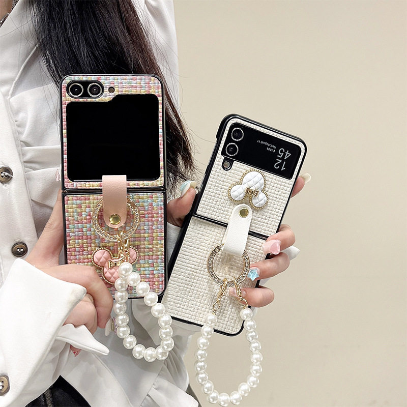 适用三星zflip5折叠屏翻盖编织纹皮zflod6手机壳珍珠手提链xflip水钻W24flip指环ins风热巴同款华为P50pocket