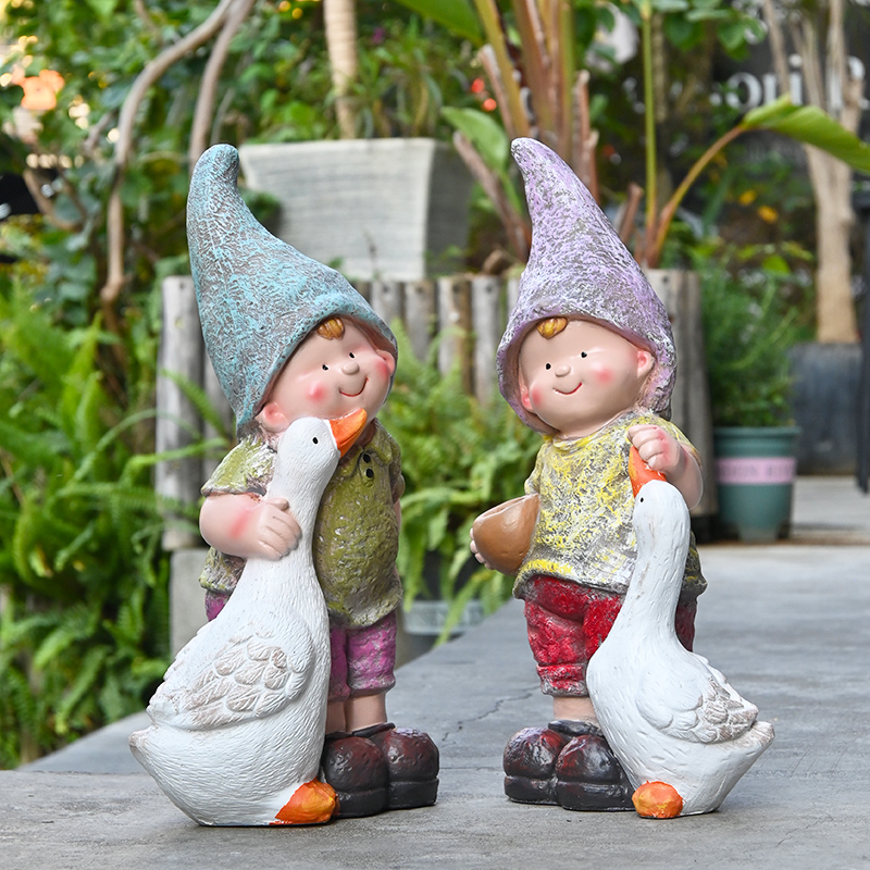 花园庭院别墅喂鹅娃娃造景装饰幼儿园户外卡通人物小.孩雕塑摆件