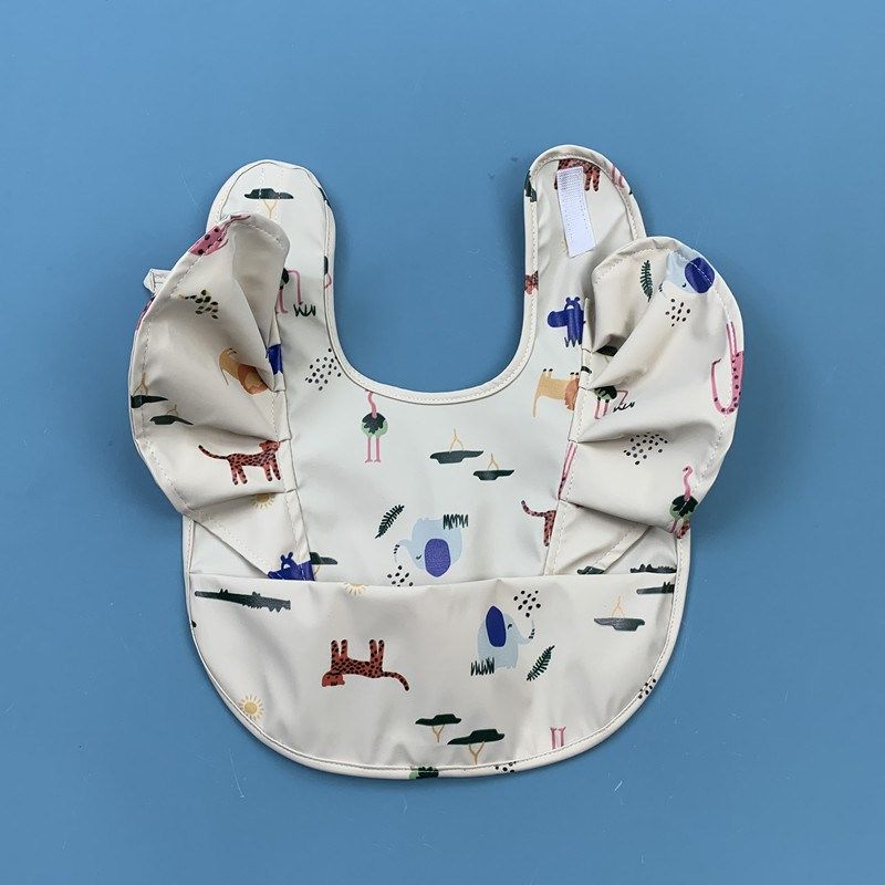外贸婴儿童防水Pu软塑料w皮革围嘴宝宝饭兜围兜罩衣口水巾