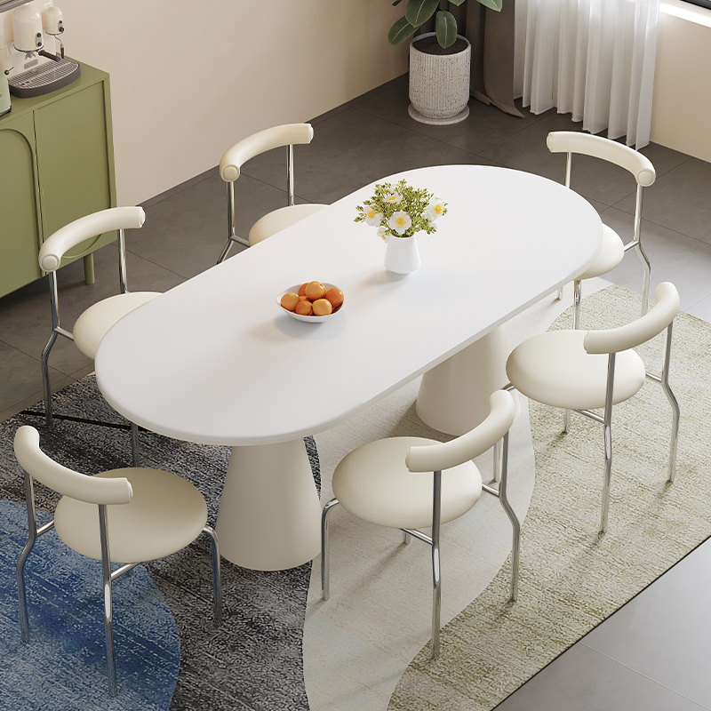 奶油风岩板餐桌i椅组合现代简约小户型家用椭圆形网红圣杯吃饭桌