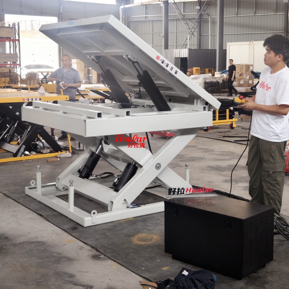 定做各种1/2吨侧翻电动升降平台侧翻液压平台台面倾斜翻转升降机