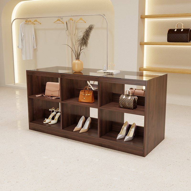 服装店玻璃中岛柜流水台女装饰品摆件陈列展示桌店铺中.古风储物