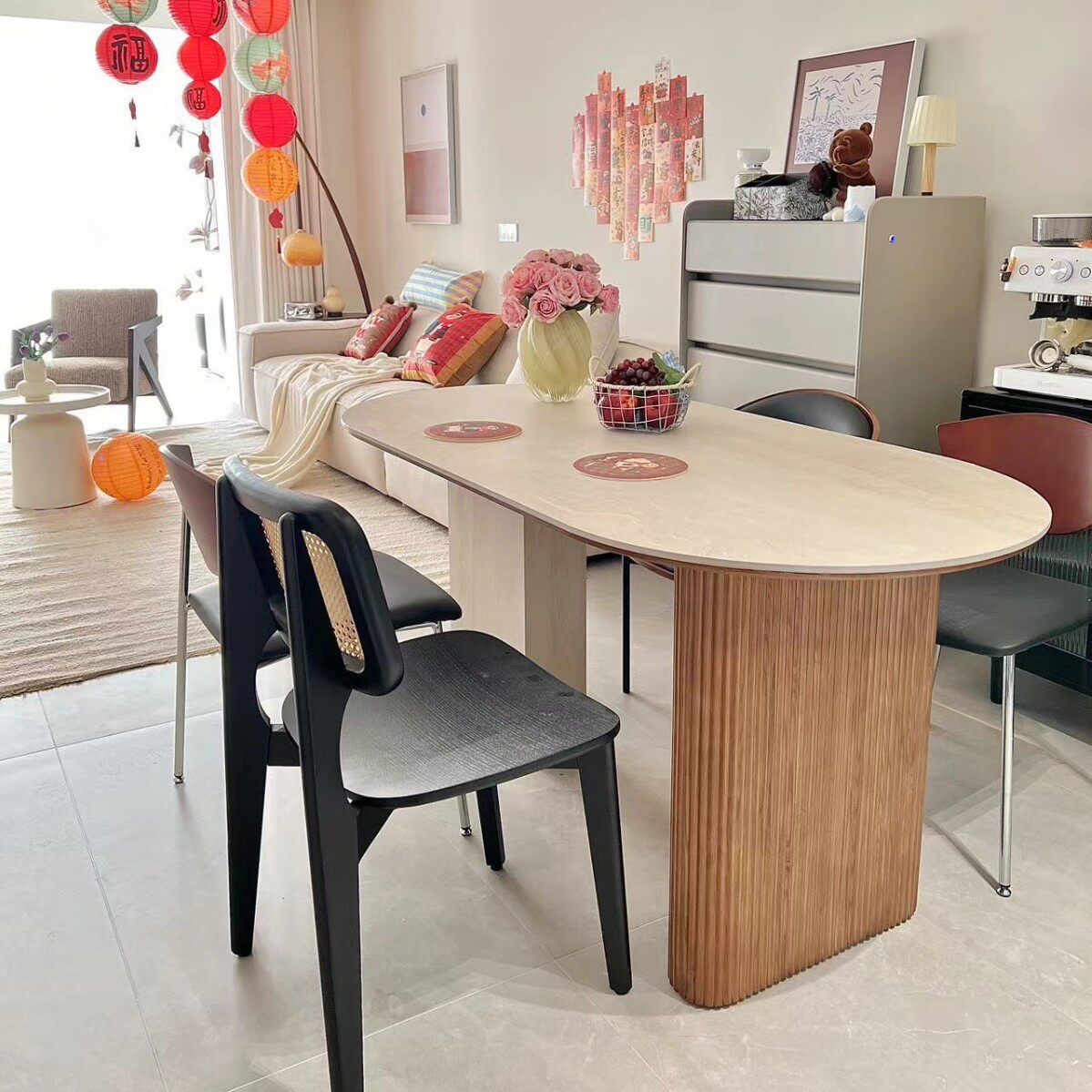 2025年新款中古风白蜡木餐桌洞石岩板小户型椭圆形设计师法式饭桌