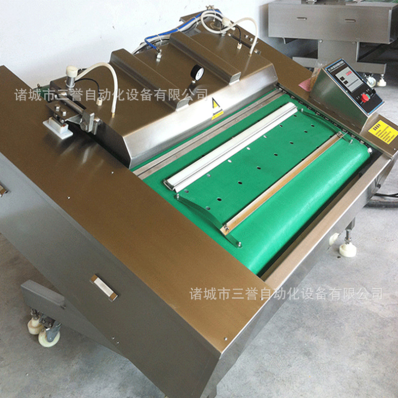 SY-1000滚动式包装机 海产品连续式真空包装机 卤制品包装设备