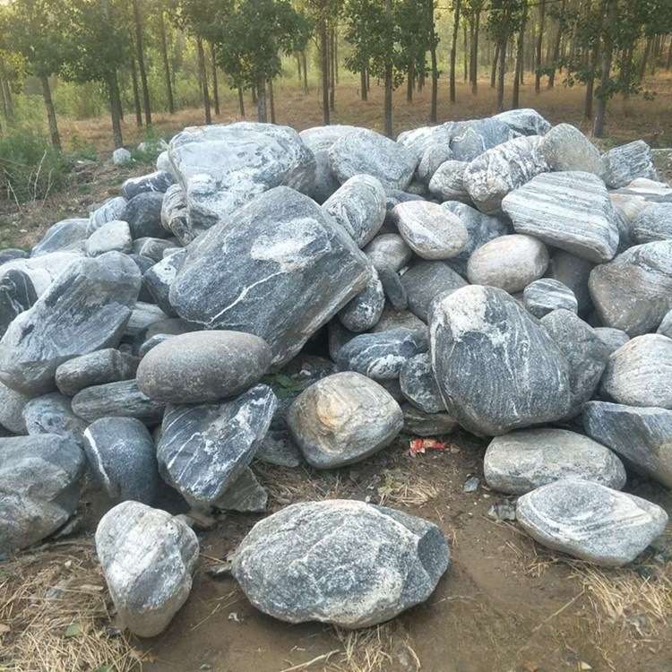 黑山石置石 石蛋园林绿化原石厂家买卖 景观河道景石造景黑色置石