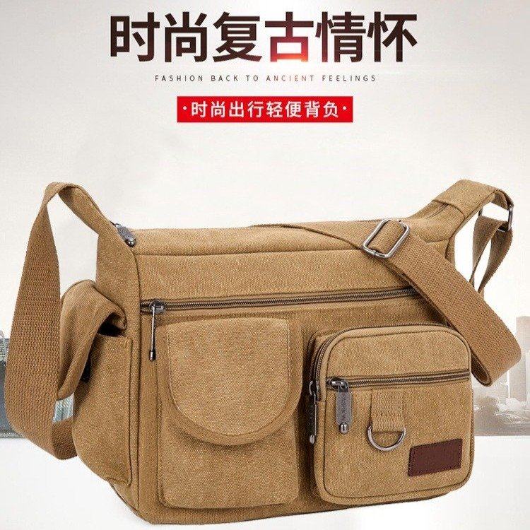 2022新款男式休闲男包帆布包按钮