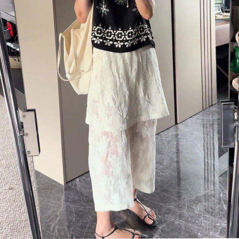 白色时尚镂空简花屁帘九提分裤女夏季新款瘦约nVAN5c8p显百搭阔腿