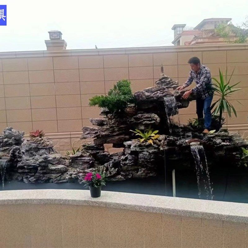 成都花园鱼池假山设计施工假山现场制作鱼池吸水石太湖石好看