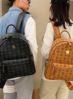 超大容量铆钉印花背包男双肩包2021年新款时尚百搭情Y侣款女士书
