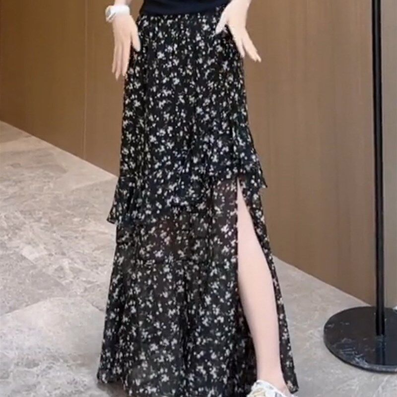 黑色碎花半身裙女2024年夏季新款法式荷叶边不规则开衩中长款裙子