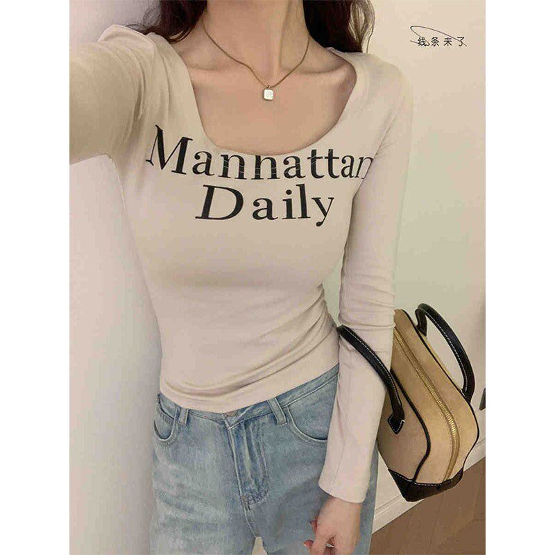 白色正肩长袖女t恤秋冬2024新款今年流行显瘦纯棉打底衫气质上衣