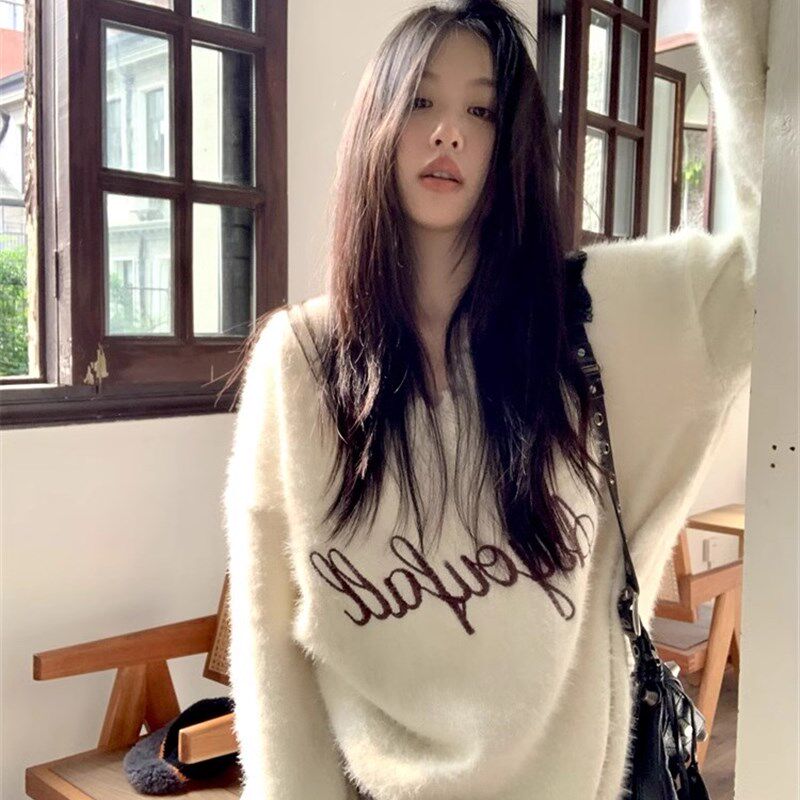 小众高级设计感破洞V领针织毛衣女秋冬季加厚宽松慵懒风套头上衣