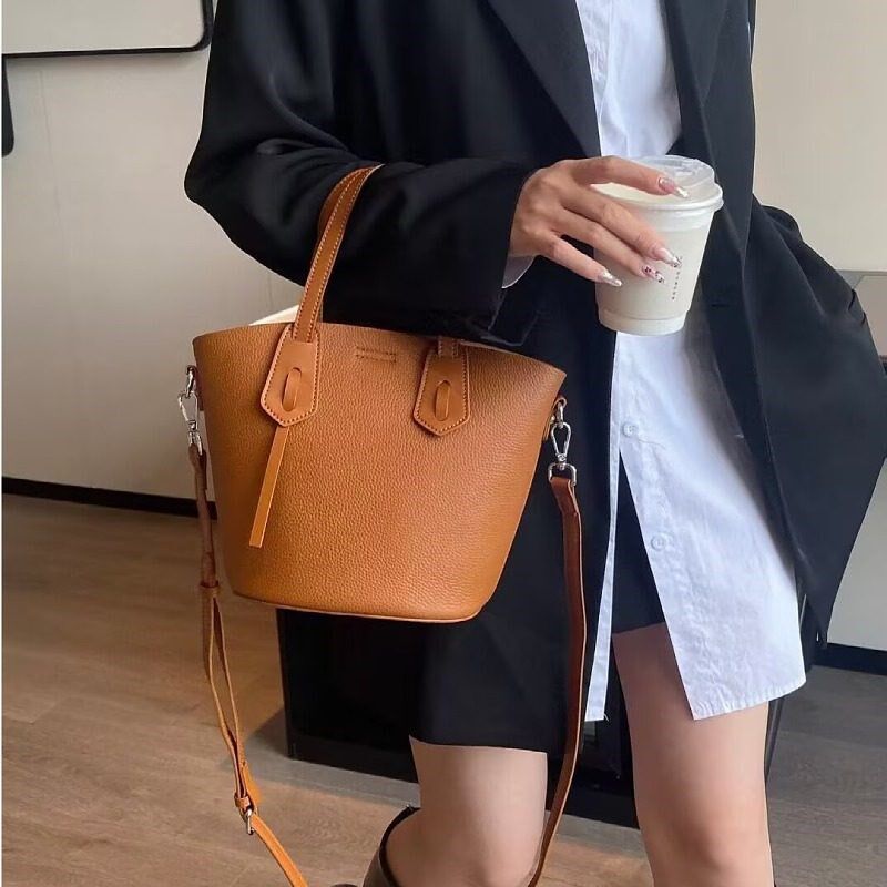小众新品真皮女包韩版百搭甜美淑女手提单肩简约头层牛皮水桶包