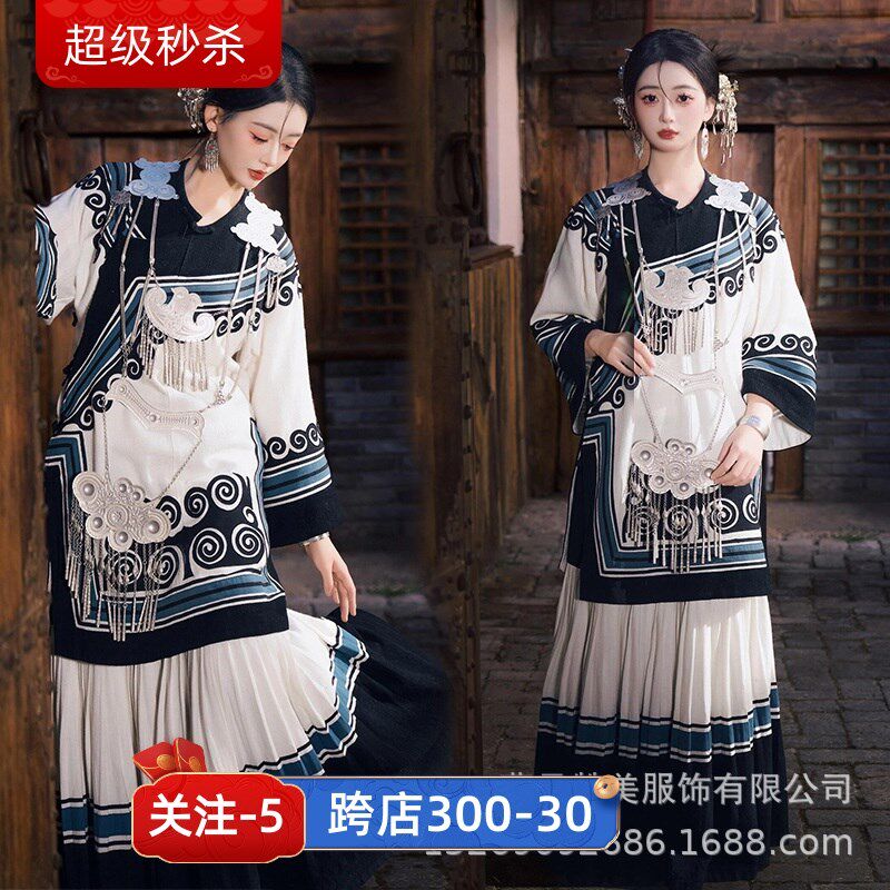 换图苗疆少女黑色彝族民族风云南少数民族服装女写真拍照影楼摄影