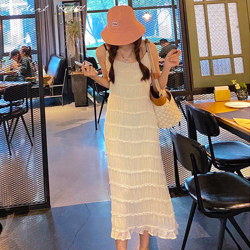 三亚海边度假沙滩长裙夏旅游拍照超仙显瘦初恋白色雪纺吊带连衣裙