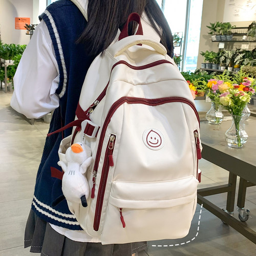 初中生书包女大学生高颜值大容量高中双肩包中学生轻便背包宽肩带