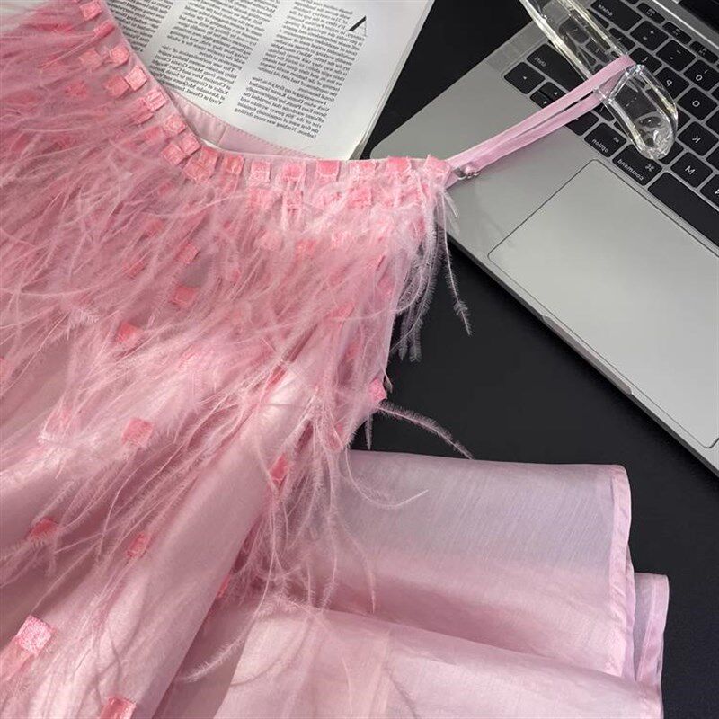 法式粉色温柔吊带连衣裙女2025夏季新款小个子度假风海边流苏长裙