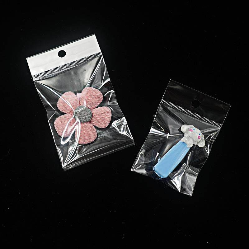 现货加包厚KBHopp不干胶透色明自袋白卡头袋吊孔袋手粘套装袋挂孔