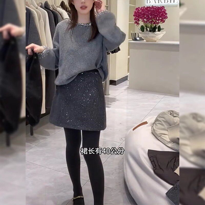高级感精致a字半身裙女冬季新款大码梨形身材小个子加厚包臀短裙