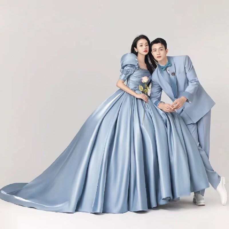 影楼主题服装2023年新款情侣写真拍照礼服摄影蓝色拖尾泡泡袖婚纱