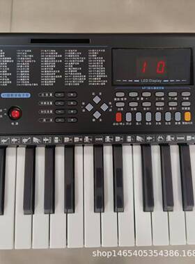 跨键境永美琴Y-6300电子琴成人儿童初学者61智能发光跟弹MYM-6300