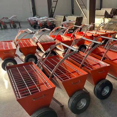 推手式金刚砂料机电动耐地磨坪布料DNR车混撒凝土地面撒布下料摊