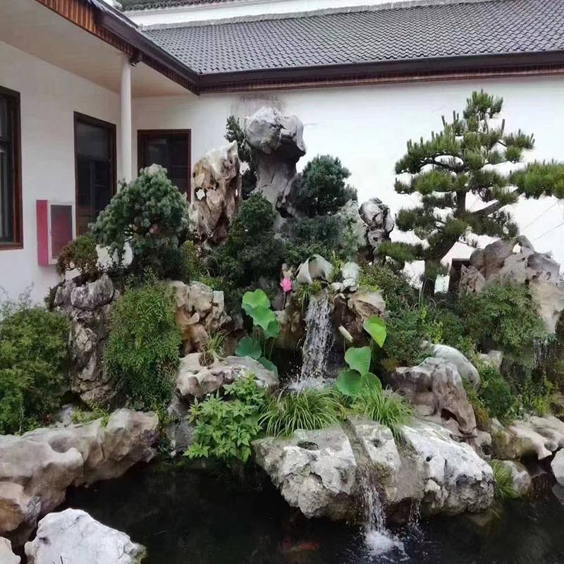 大型太湖石假山石料 天然景观石多少一吨鱼池假山流水造景制作