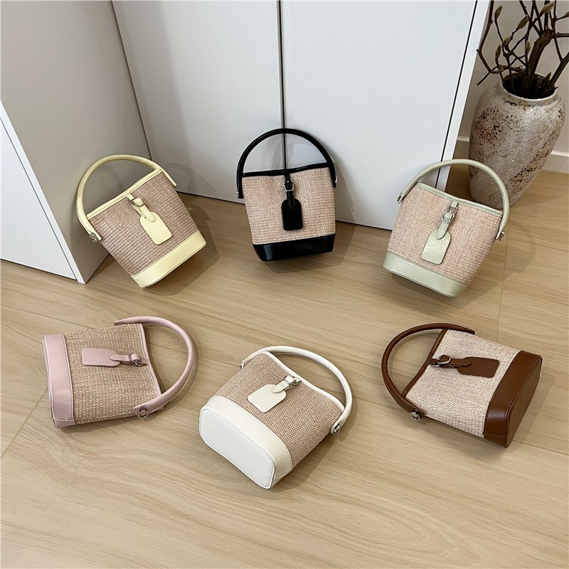 小脏柜 高级感小众设计夏季草编包复古拼接水桶包手提单肩斜挎包
