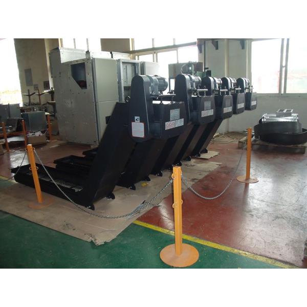 根据机床结构专业设计、生产“华德”集中排屑系统装置