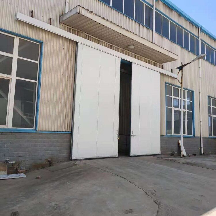压型彩钢复合板有轨平移门工业平移推拉钢大门采用上承重下导向等
