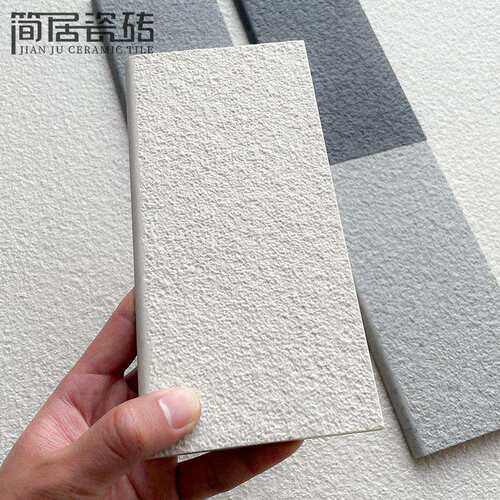 奶油色全通体荔枝纹麻面瓷砖别墅室外庭院子阳台广东佛山地砖墙砖