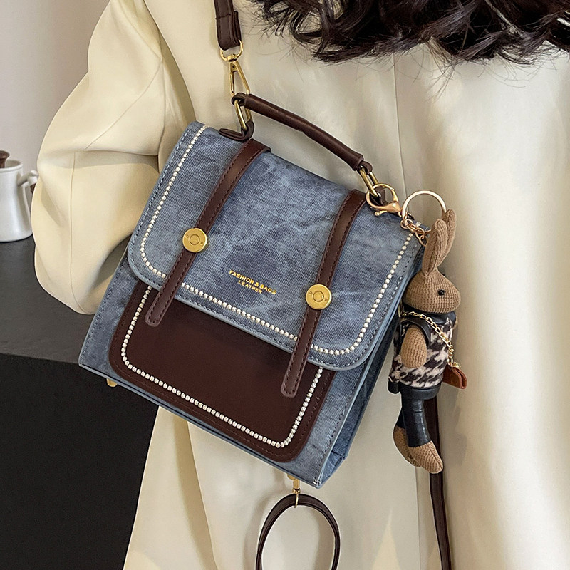 高级感小型牛仔一包三用双肩包女2025新款时尚斜挎短途旅行小背包