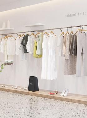 不锈钢拉丝上墙挂衣架装店XVL创意异形衣服货展架示架落服地式陈