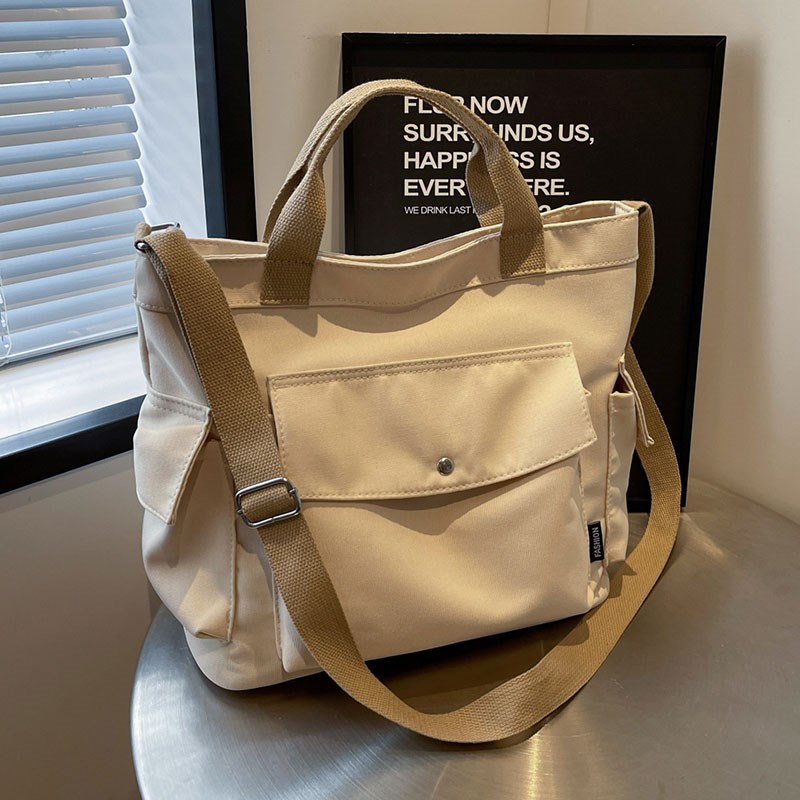 加厚多口袋日系帆布包女2r024新款休闲大容量学生手提单肩斜挎书