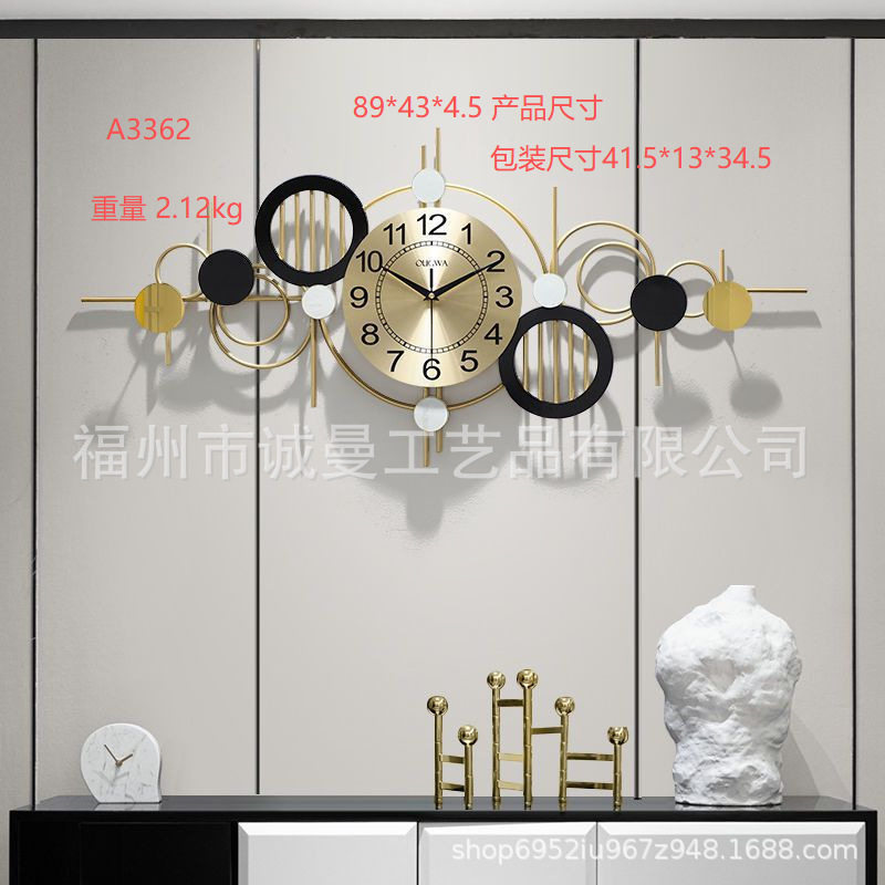 现代简约挂墙挂钟客厅家用时尚免打孔钟表创意轻奢风餐厅墙上挂表
