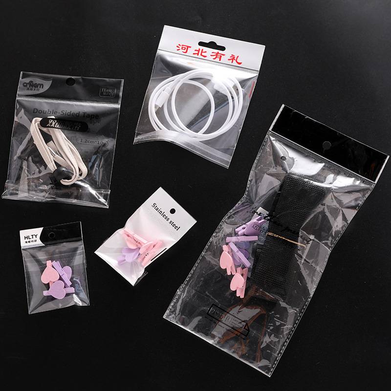 现货 透明塑料袋 加厚白色卡头袋宽度18自粘袋挂孔袋竹手套包装袋