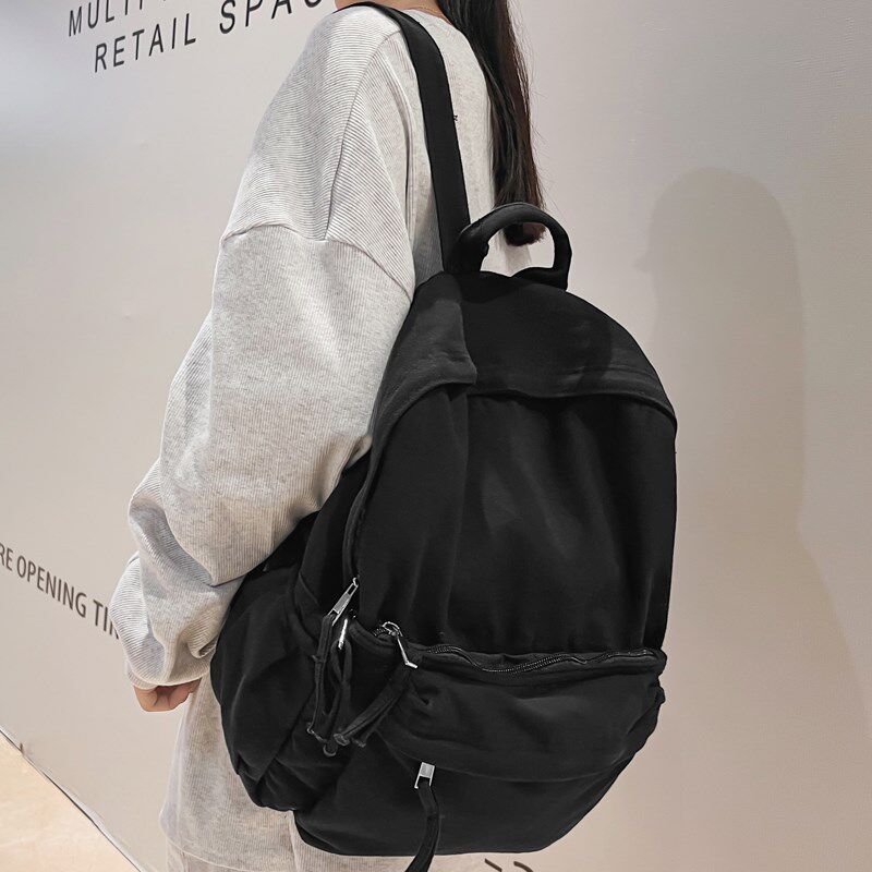 港风书包女水洗帆布学生大容量双肩D包男纯色简约高中生上课背包