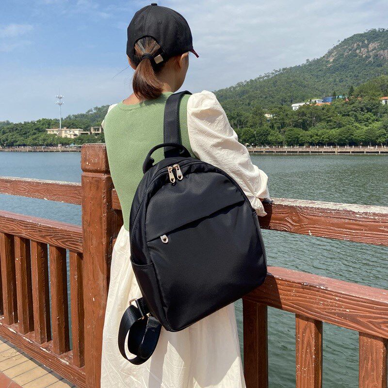 双肩包女2024新m款潮旅行防水牛津布小背包通勤轻便帆布纯色小书