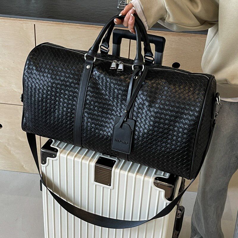 高品质编织皮革短途高级感男女手B提斜挎黑色旅行包潮大容量出差