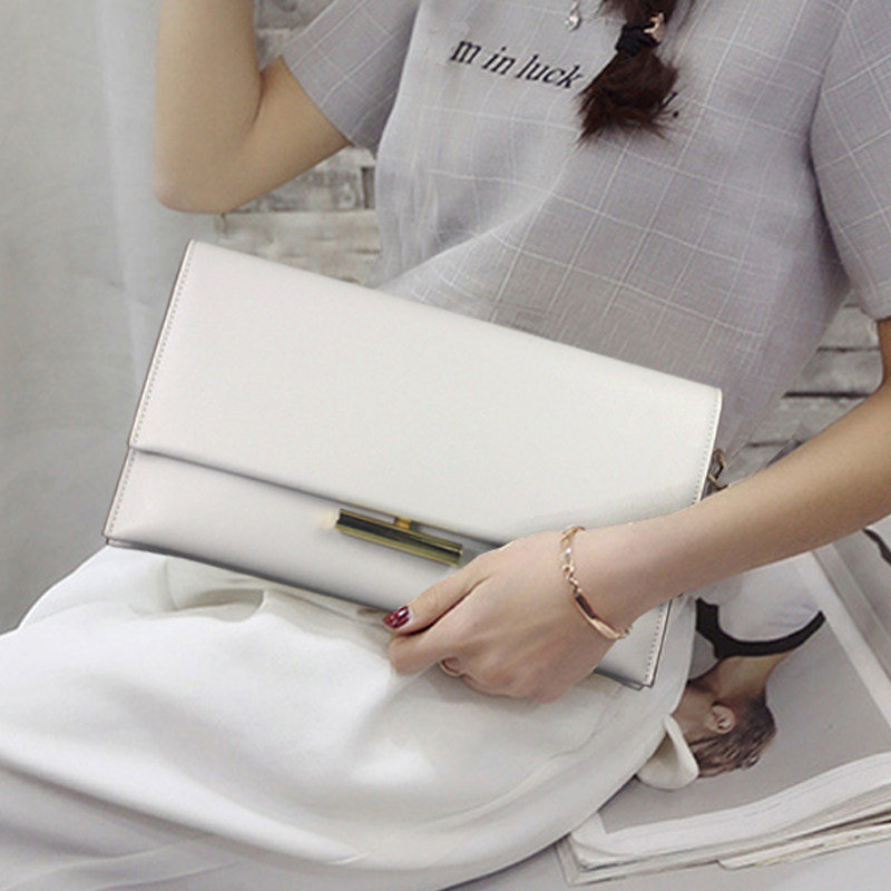 女士真皮手拿包女包2021新款夏季白色时尚气质手包小众斜挎小包包
