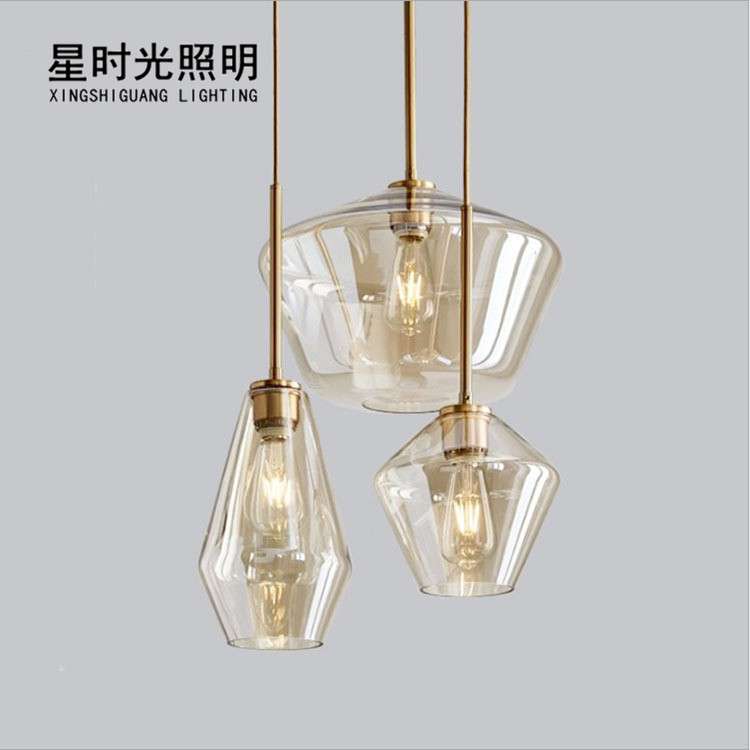 北欧现代简约咖啡厅设计师创意吧台客厅灯餐厅电镀香槟金玻璃吊灯